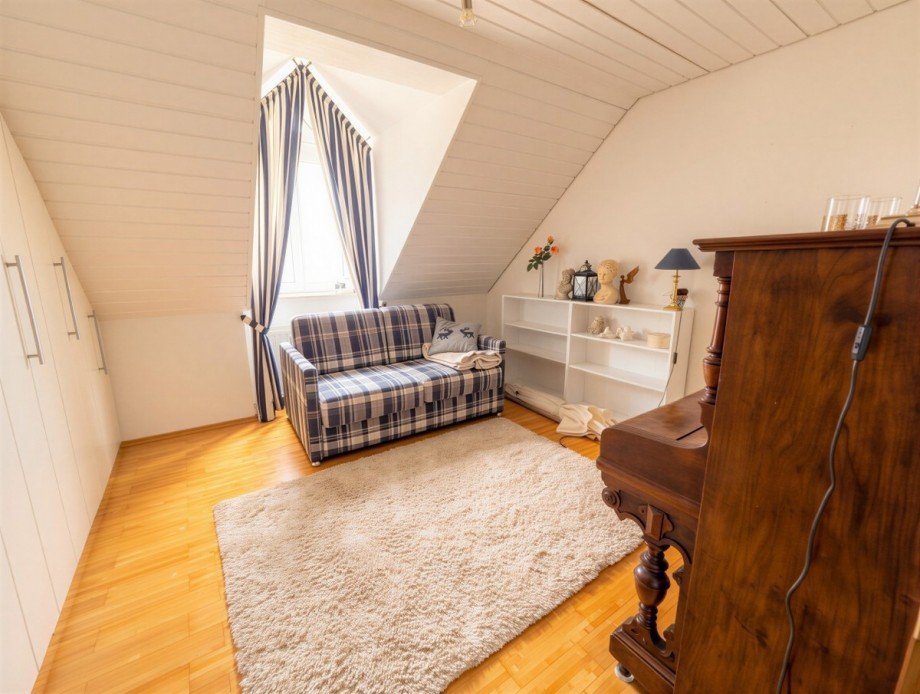 Schlafzimmer 2 Dachgeschosswohnung Wei�enhorn