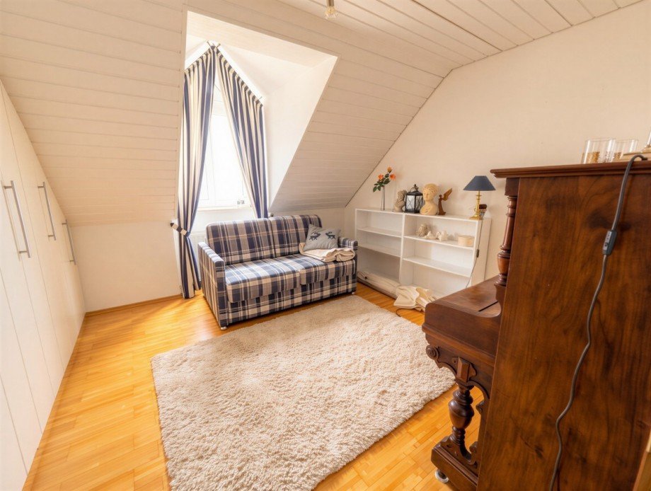 Schlafzimmer 2 Dachgeschosswohnung Wei�enhorn